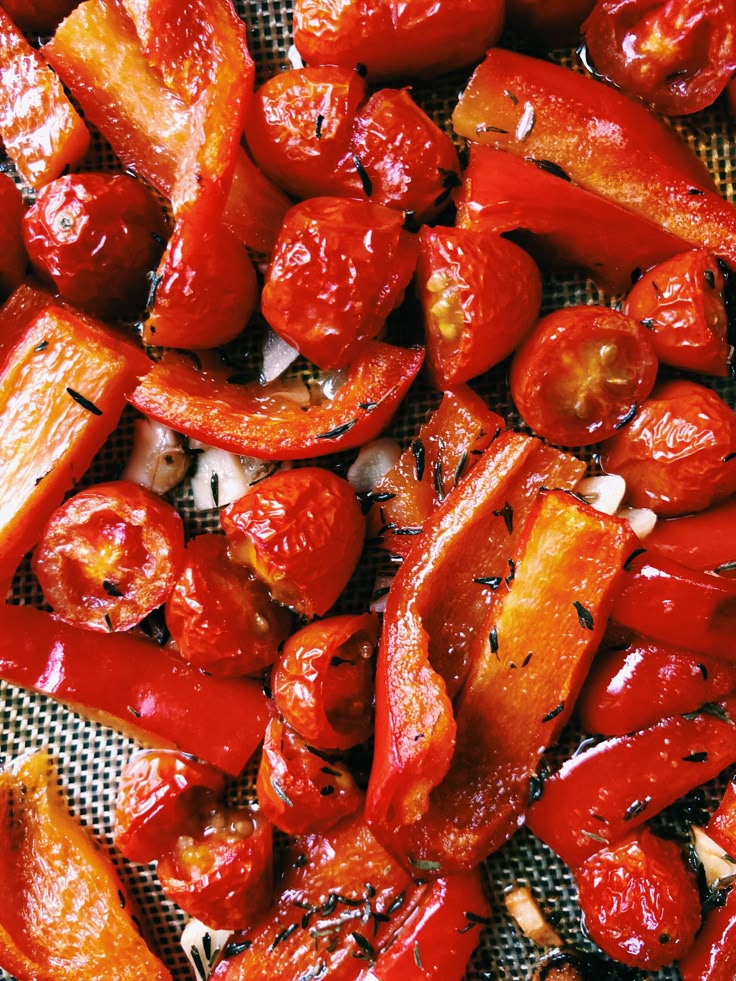 roasted red peppers and onions on a cloth