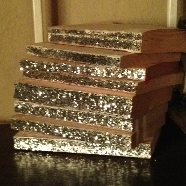 a stack of books sitting on top of a table