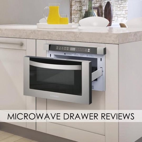 a kitchen with white cabinets and stainless steel microwave in the center, open door to reveal an empty dishwasher