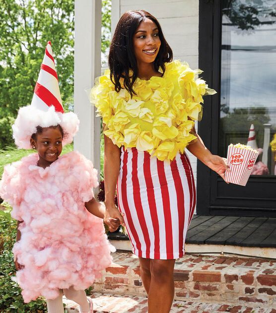 a woman and child dressed up in costumes