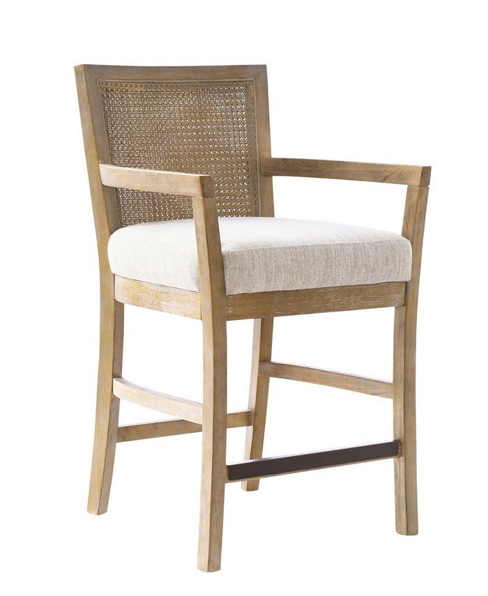 a wooden chair with a white upholstered seat and backrest, against a white background