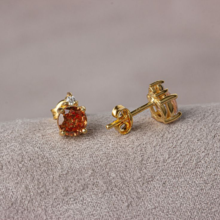 Citrine stone; The natural stone, known as the stone of success or money, is believed to bring money, abundance and fertility for centuries. Dazzle with opulence with these timeless pieces, elegantly designed to enhance your look. Precisely crafted and studded with real diamonds, these earrings are a true testament to luxury. Elevate your style and captivate your hearts with the charm of citrine and the brilliance of diamond. Trust the quality of 14K gold and pamper yourself with a sophisticated touch. Citrine is the birthstone for those born in November. 🤍🤍 Special gifts for your special moments. We produce our jewelery for you in the most perfect way. 🤍🤍 All of our products are made of 14K Solid gold. FEATURES * Sold as Single or Pair * Gold Color Selection: Yellow Gold, Rose Gold, W Gold Cubic Zirconia Earrings With Gemstones, Fine Jewelry Topaz Earrings With Prong Setting, Yellow Gold Topaz Earrings, Round Shape, Yellow Gold Gemstone Diamond Earrings Gift, Gold Diamond Gemstone Earrings For Gifts, Gold Gemstone Diamond Earrings For Anniversary, Gold Diamond Gemstone Earrings For Anniversary, Orange Earrings For Anniversary In Fine Jewelry Style, Orange Brilliant Cut Jewelry For Gift