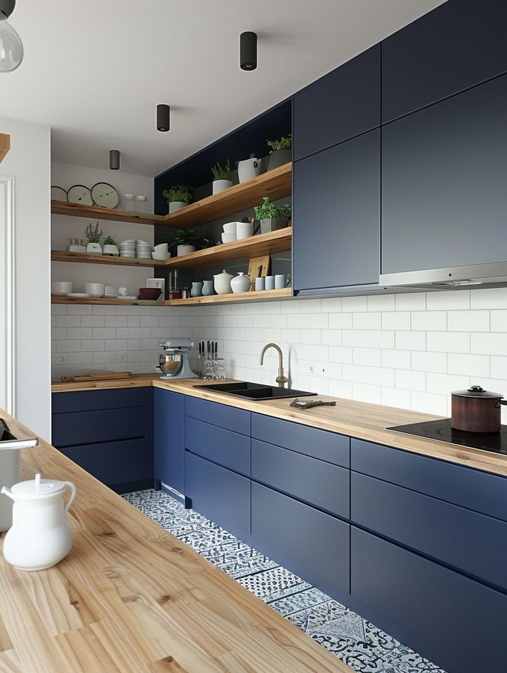 a kitchen with blue cabinets and wooden counter tops