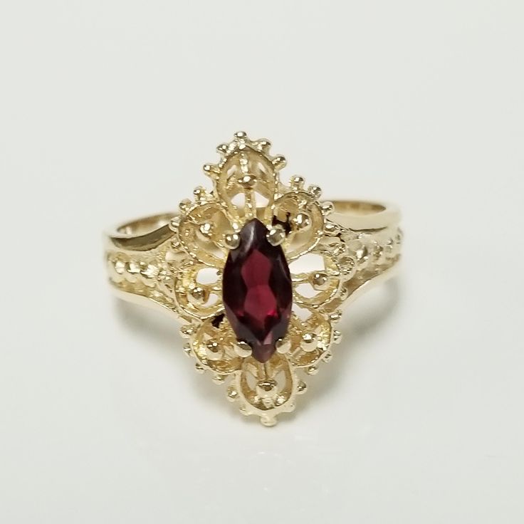 Thanks for shopping our vintage estate store. We tend to sell well below wholesale and truly hope you enjoy all of our items. Many of the items are one of a kind, so please enjoy scrolling through the pictures and hopefully something will catch your eye. Brown spots are from the camera or reflections. Estate 14k yellow gold natural marquise .50ct marquise garnet ring. Ring is from the early 1990's or maybe 1980's.  Ring size: 6.5 Setting: 5/8" by 3/8" Band width: 2mm Weight: 3.31 grams Sweet ring, mark worn or sized out, testing 14k. Sweet Ring, Put A Ring On It, Garnet Rings, Natural Red, Multi Stone, Multi Stone Ring, Stone Rings, Garnet, Ring Size