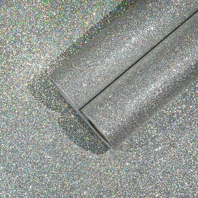 a roll of glitter paper laying on the ground