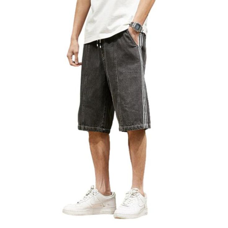 Loose denim shorts with bands online—excellent jeans shorts from the 2022 Summer collection. Street style lets you focus on individualism and not strictly on current fashion trends. Stonewashed pattern increases the softness and flexibility of denim. Loose fit is excellent news for those who like more comfort and room to move about in their denim. For a short torso, mid-rise may fit like a high-rise (high-rise denim may fit too far above the natural waist). Cotton is strong and wear-and-tear res Sporty Jean Shorts With Built-in Shorts For Spring, Sporty Cotton Jean Shorts For Summer, Summer Cotton Jeans With Drawstring, Trendy Summer Jeans With Drawstring, Spring Streetwear Shorts With Drawstring, Summer Denim Jeans With Drawstring, Sporty Denim Shorts, Summer Drawstring Denim Jeans, Trendy Streetwear Shorts With Drawstring