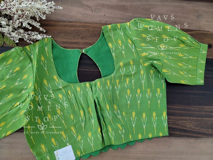 Festive Cotton Handloom Tops, Festive Handloom Cotton Tops, Cotton Cutdana Tops, Green Cotton Blouse For Navratri, Fitted Ikat Print Blouse Piece, Fitted Ikat Print Blouse For Festive Occasions, Fitted Ikat Print Festive Blouse, Traditional Fitted Ikat Print Top, Festive Fitted Ikat Print Blouse