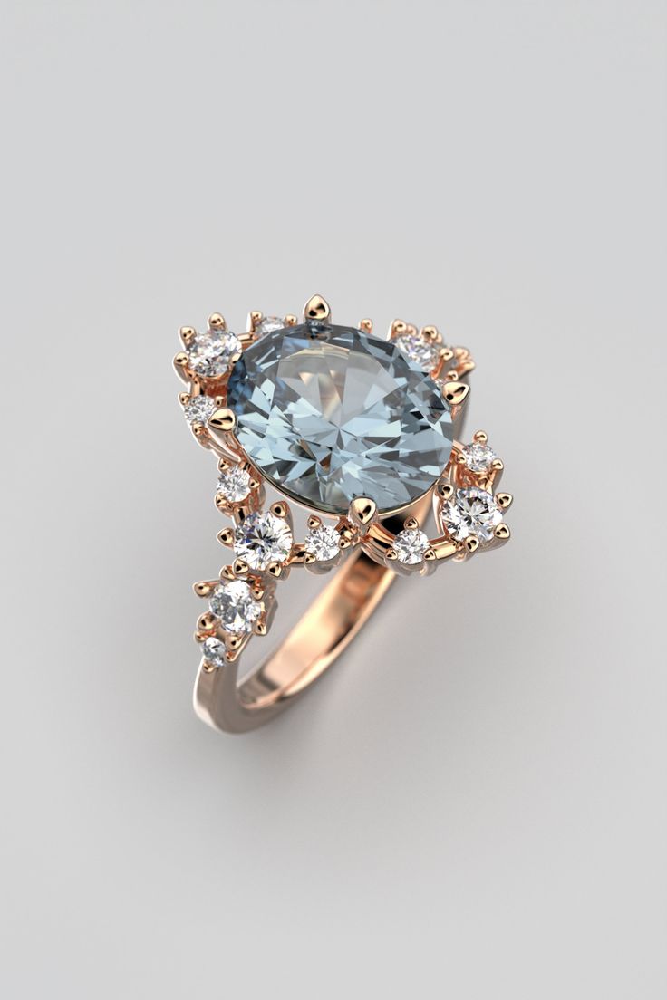 Enhance your romantic narrative with our exquisite Engagement Ring featuring a Natural Aquamarine and Diamonds, meticulously crafted by Oltremare Gioielli in Italy. This enduring piece highlights a dazzling oval-shaped aquamarine, approximately 2.3 carats, boasting a captivating light blue hue. The aquamarine, measuring 10 x 8 x 5.2mm, ensures a captivating presence on the finger. At the heart of the design, the aquamarine takes center stage, embraced by a halo of diamonds totaling around 0.48 carats. These diamonds not only accentuate the brilliance of the aquamarine but also add an extra layer of sophistication and sparkle to the ring. Each ring is tailored to your preferences, allowing for customization of this symbol of your love. Opt for 14k or 18k solid gold in white, rose, or yellow Elegant Rose Gold Sapphire Diamond Ring, Elegant 14k Gold Cushion Cut Sapphire Ring, Elegant Promise Topaz Ring With Brilliant Cut, Elegant Topaz Ring With Moissanite Accent Stones, Elegant 14k Gold Halo Ring With Rose Cut Diamonds, Elegant Marquise Cut Topaz Ring With Accent Stones, Elegant Sapphire Ring With Moissanite, Elegant Rose Gold Sapphire Ring With Rose Cut Diamonds, Elegant Sapphire Moissanite Ring