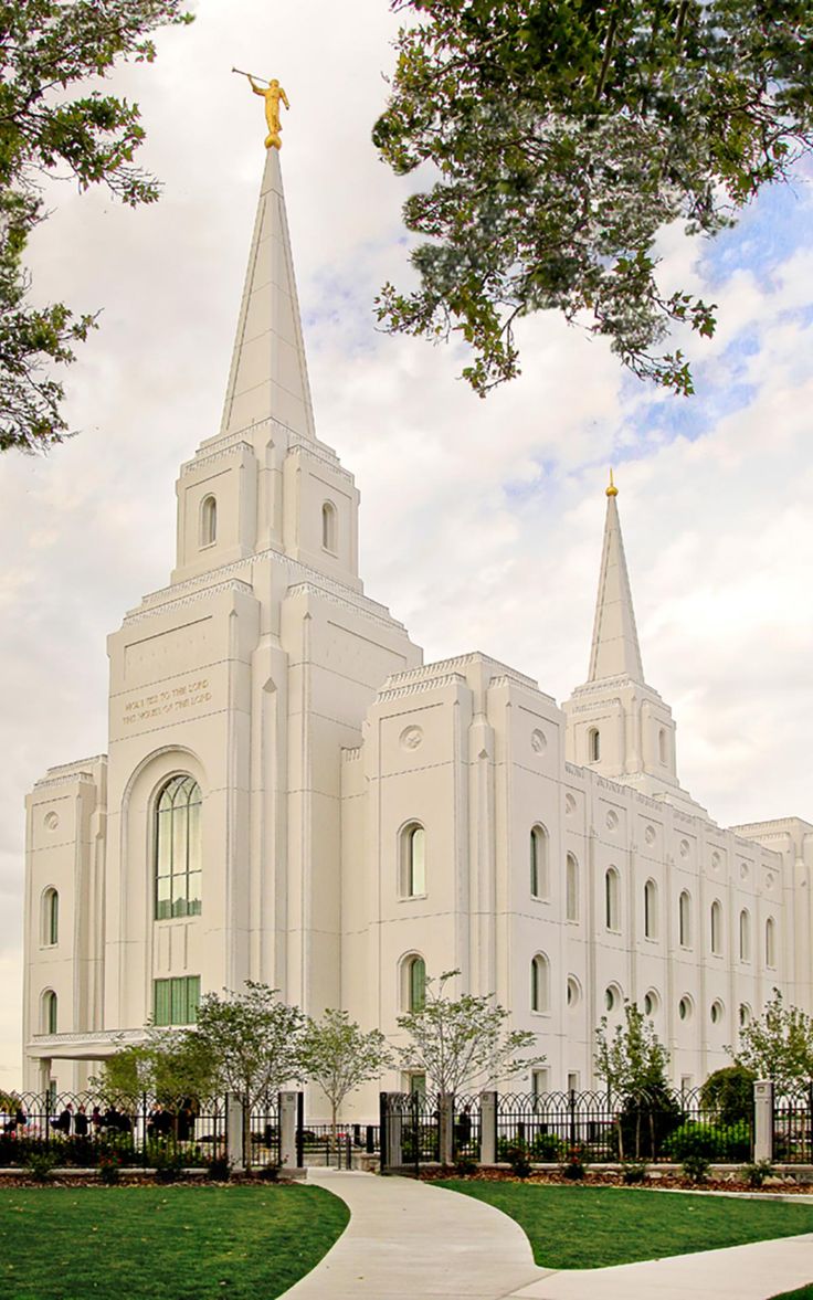 a large white church with a tall steeple