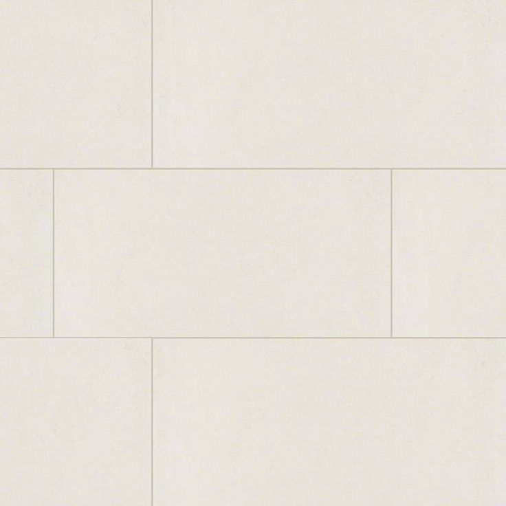 a white tile wall that is very clean