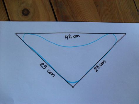 a piece of paper that has a drawing of a triangle on it with the area shown below