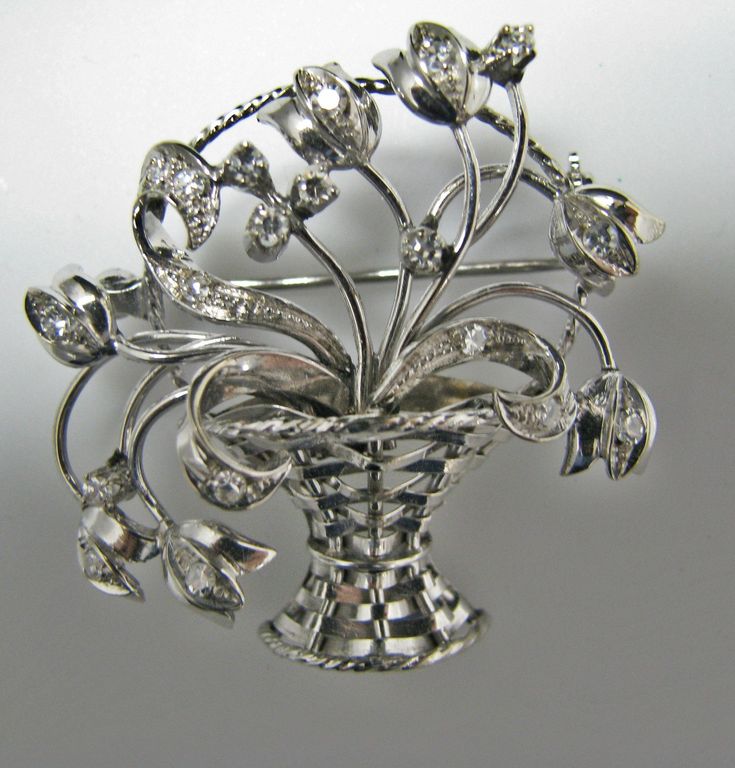 "For Sale: (1) H155 Gorgeous Basket of Flowers in 14k White Gold Pin/Brooch with Diamonds PLEASE READ ENTIRE DESCRIPTION BEFORE PURCHASING Please see pictures for more details! Beautiful and unique brooch/pin featuring 14k white gold basket of flowers with multiple diamonds brooch/pin. This brooch made as a basket with beautiful tulips inside. Such a stunning gift for any special occasion! Specifics: *14k White Gold *Each diamond is approx. 0.02ct *Multiple small diamonds All Measurements Below Vintage White Gold Brooches With Brilliant Cut, Luxury White Gold Brooches For Anniversary, Exquisite Hallmarked Brooches For Anniversary, Platinum Brooch Jewelry For Anniversary, White Gold Brooch Fine Jewelry For Anniversary, White Gold Brooch For Anniversary In Fine Jewelry Style, White Gold Brooches For Anniversary In Fine Jewelry Style, White Gold Brooches For Anniversary Fine Jewelry, Vintage Platinum Brooches For Anniversary