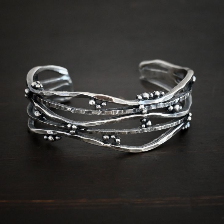 - Sterling Silver - 4mm thick x 17mm wide - Wrist Size: Small 6″, Med, 7″, Large 8″ - Handmade so each cuff will vary slightly - heavy duty to last a lifetime Follow Us: Instagram: https://www.instagram.com/wildprairiesilver/ Facebook: https://www.facebook.com/wildprairiesilver/ Visit our Jewelry Website www.wildprairiesilver.com Handmade Jewelry Supplies www.savannahjewelrysupply.com Contact Us: Call or Text: 920-365-6341 Email: info@wildprairiesilver.com Contact Hours: Monday - Friday (8am-4pm Hammered Bangles, Handmade Silver Jewellery, Metal Cuff Bracelet, Metal Clay Jewelry, Silver Jewelry Design, Jewelry Website, Funky Jewelry, Sterling Silver Bangles, Sterling Silver Cuff