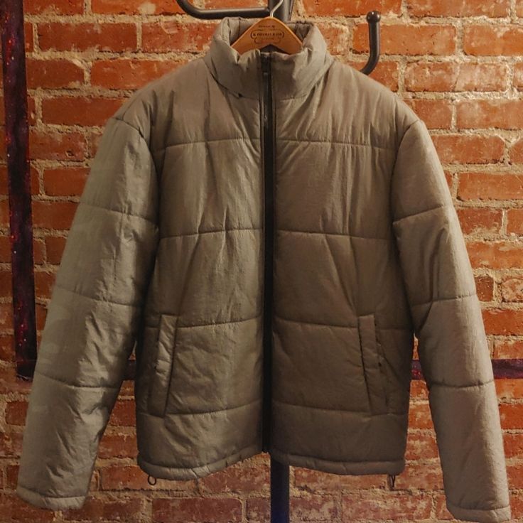 Never Worn Kenneth Cole Puffer. Its An Awesome Jacket, Just Not For Me. Feel Free To Make An Offer Casual Khaki Winter Puffer Jacket, Casual Khaki Puffer Jacket For Winter, Solid Insulated Long Sleeve Outerwear, Insulated Long Sleeve Outerwear For Fall, Casual Khaki Puffer Jacket For Cold Weather, Khaki Puffer Outerwear For Cold Weather, Fitted Khaki Outerwear For Outdoor Activities, Gray Puffer Outerwear For Cold Weather, Urban Quilted Jacket For Cold Weather And Fall