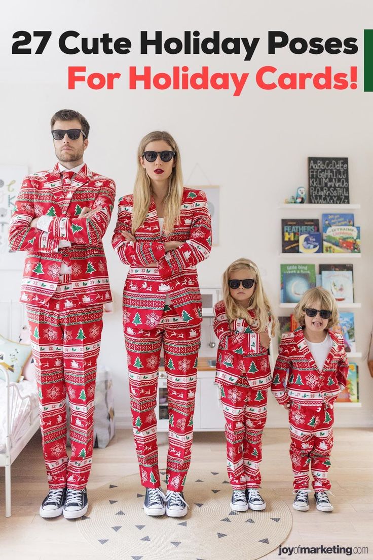 a man and woman in matching christmas pajamas standing next to their daughter, who is wearing sunglasses