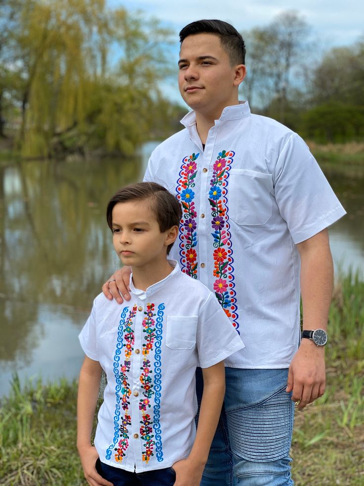 Beautiful Traditional Guayabera for Boys. This elegant button up Shirt is perfect for a special occasion such as First Communion, Baptism, Weddings, etc. Traditional White Shirt For Festivals, Embroidered Traditional Fit Top For Summer, Traditional Fit White Shirt For Spring, Embroidered Traditional Fit Summer Tops, White Traditional Fit Shirt For Spring, Casual Embroidered Shirt Traditional Fit, Casual Embroidered Shirt With Traditional Fit, Embroidered Summer Tops In Traditional Fit, White Regular Fit Shirt For Spring