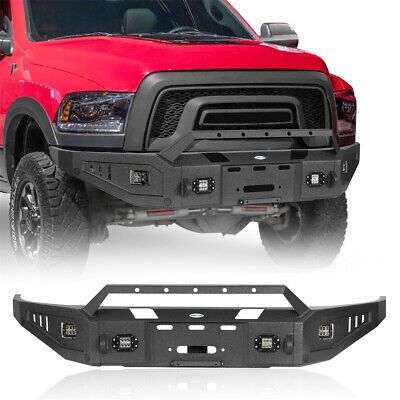 the front and rear bumpers of a red truck with black grill guards on it