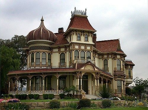 an old victorian style house in the country