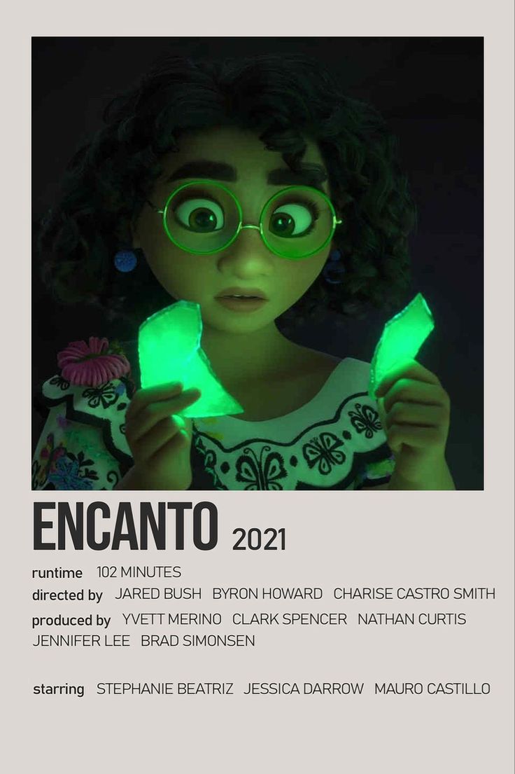 a girl in glasses holding up two green light - up hands with the caption encanto