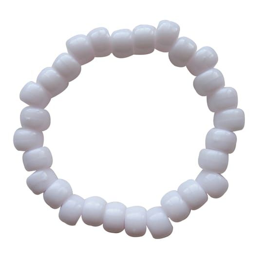 a white beaded bracelet on a white background