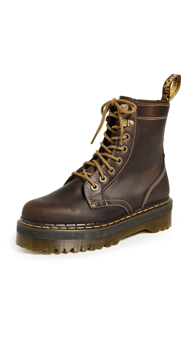 PRICES MAY VARY. Made in the USA or Imported Shaft measures approximately Ankle from arch Jadon boot is a fearless evolution of our 8-eye boot Sole Height - Platform height: 1.5 inches; Heel height: 2 inches Footbed - Slimmer and a more tapered toe shape Elevate your everyday style in the Dr. Martens Jadon Arc boots. Featuring a lace-up closure, side zipper, round toe silhouette and a chunky platform sole. Leather upper. Unlined lining. Removable EVA foam insole. Pull tab in back for easy on and 90s Combat Boots, Winter Shoe Essentials, Doc Martens Birkenstock, Cool Doc Martens, Cools Shoes, Goblincore Boots, Men Doc Martens, Farmer Boots, Timbs Boots