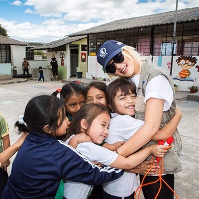 a group of young people hugging each other