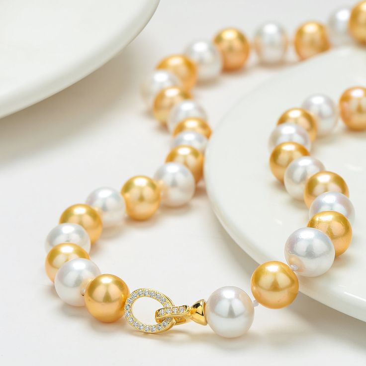 10-11mm Dyed Golden and White Freshwater Pearl Necklace
 #pearls #TimelessPearls #pearlset #pearlscollection #pearlearrings #SouthSeaPearls #PearlJewellery #PearlBling #PearlPerfection #realpearls Golden South Sea Pearls, Mabe Pearl, White Pearl Necklace, Pearl Jewelry Necklace, Purple Pearl, Freshwater Pearl Necklace, White Freshwater Pearl, White Necklace, Pearl Set