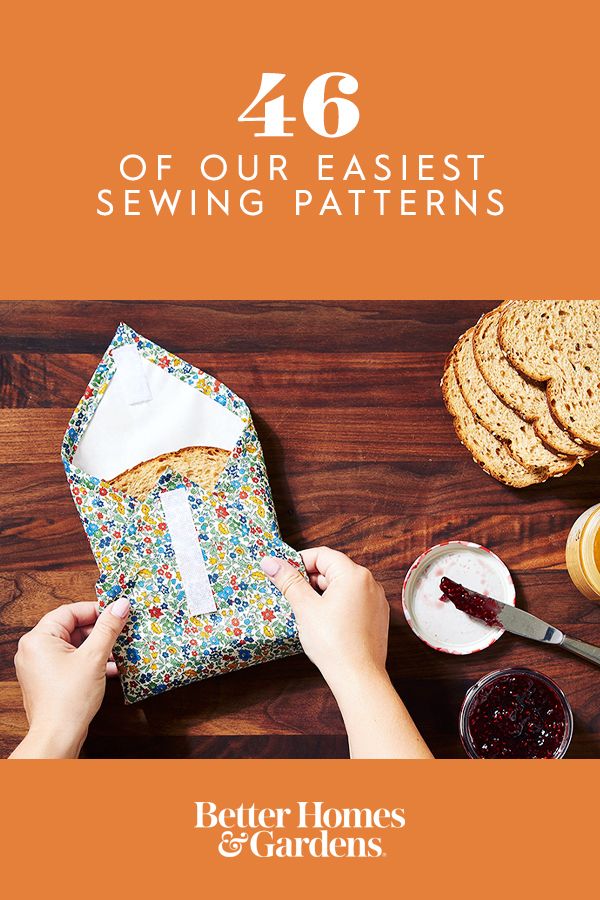 a person is sewing on a piece of fabric with bread and jams in the background