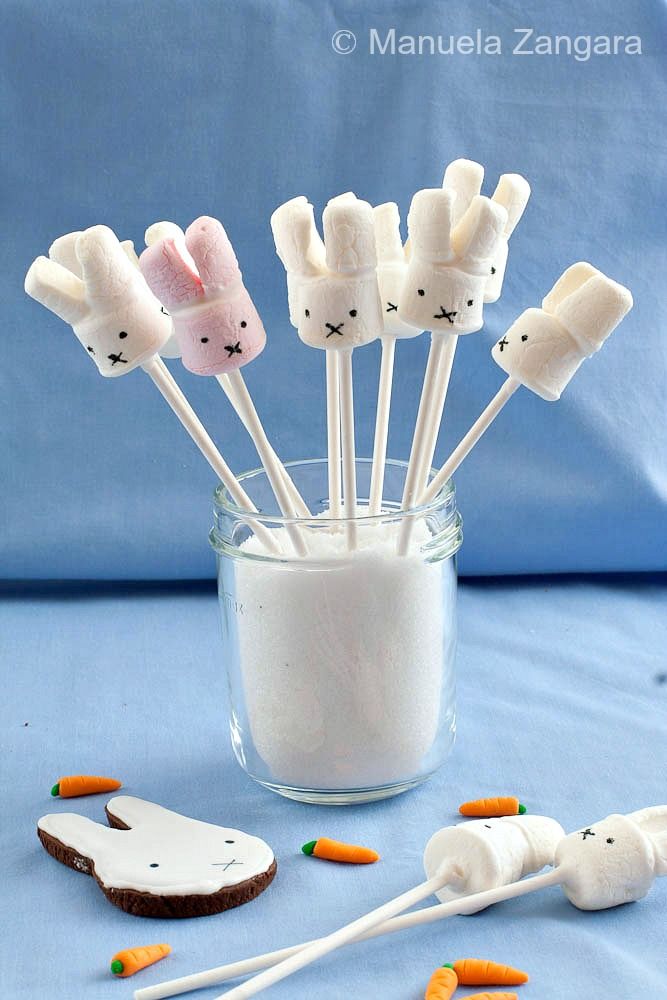 marshmallows in the shape of bunnies and carrots with faces on them