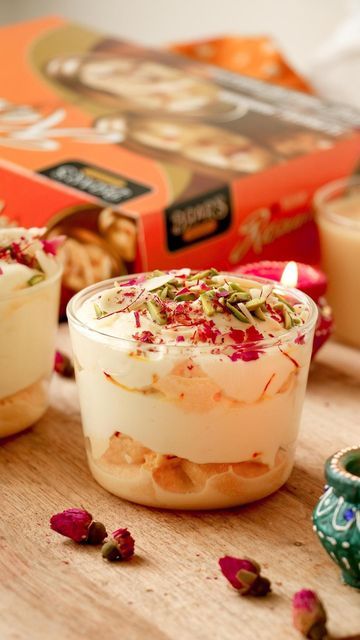 three small desserts sitting on top of a wooden table