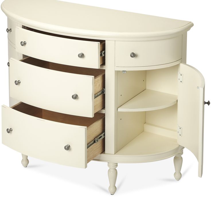 a white dresser with drawers and shelves on it