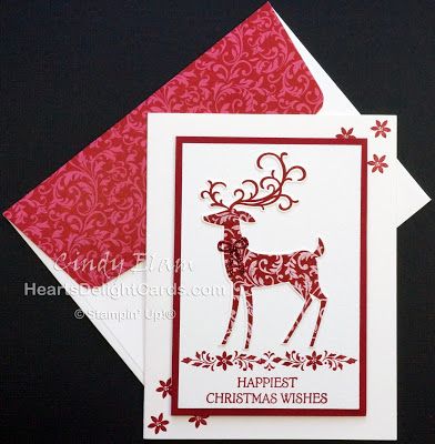 two red and white christmas cards with reindeer on them