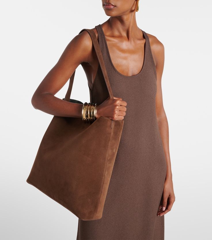 Sac Large suede tote bag in brown - Aesther Ekme | Mytheresa Leather Bags With Rolled Handles For Everyday Luxury, Chic Suede Shoulder Bag With Double Handle, Chic Double Handle Suede Shoulder Bag, Chic Suede Shoulder Bag For Work, Suede Shoulder Bag With Suede Lining For Work, Suede Tote Shoulder Bag For Work, Chic Tote Shoulder Bag With Suede Lining, Brown Calf Leather Shoulder Bag With Rolled Handles, Suede Shoulder Bag For Work