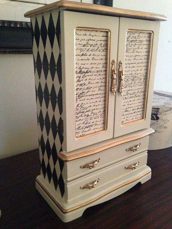 a cabinet with writing on it sitting on a table