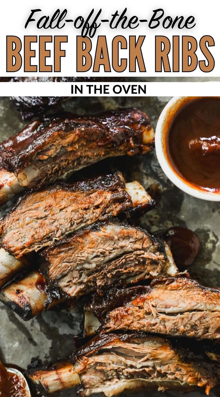 beef ribs with bbq sauce on the side and text overlay that reads fall off the bone beef back ribs in the oven