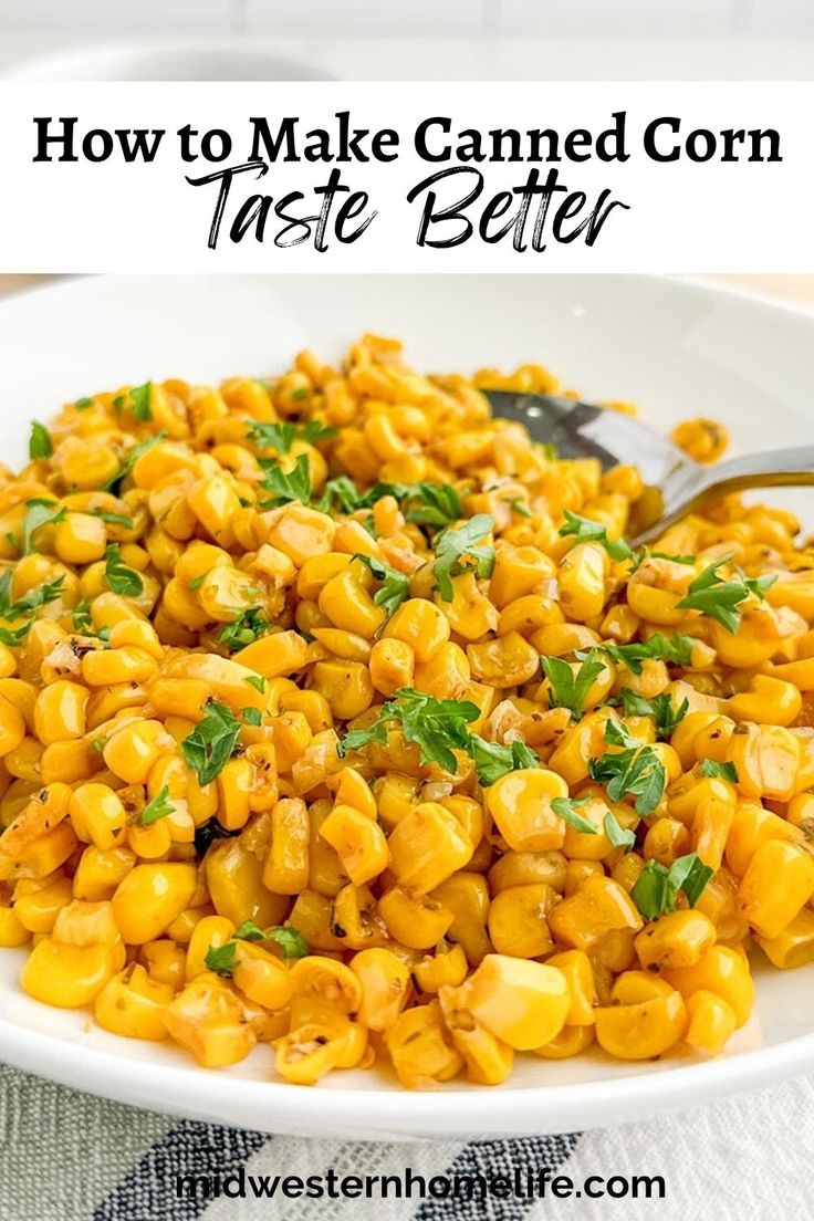 a white bowl filled with corn and garnished with parsley on the side