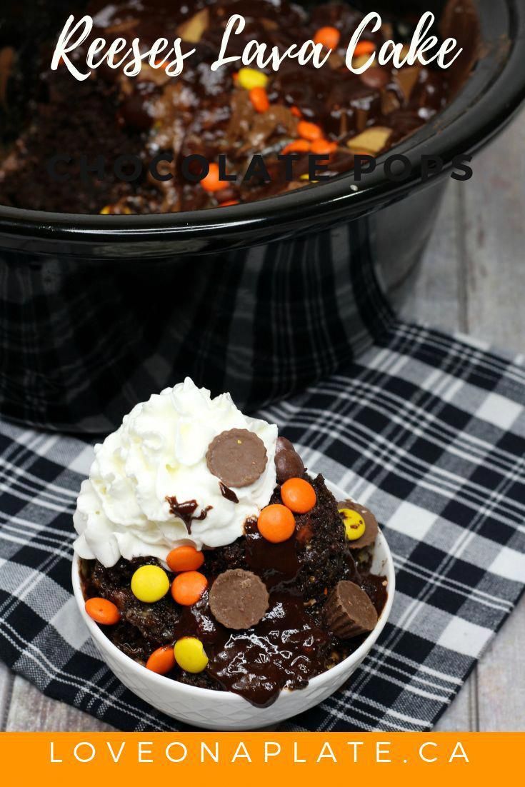 a close up of a bowl of cake with whipped cream and candy candies on top