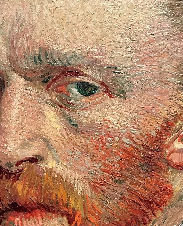 a close up of a painting of a man's face with red hair and beard