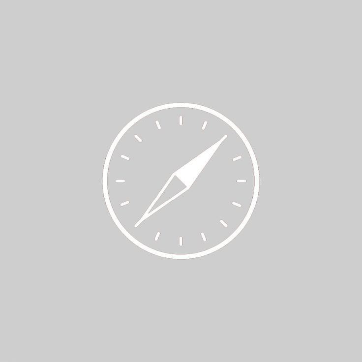 a white compass icon on a gray background