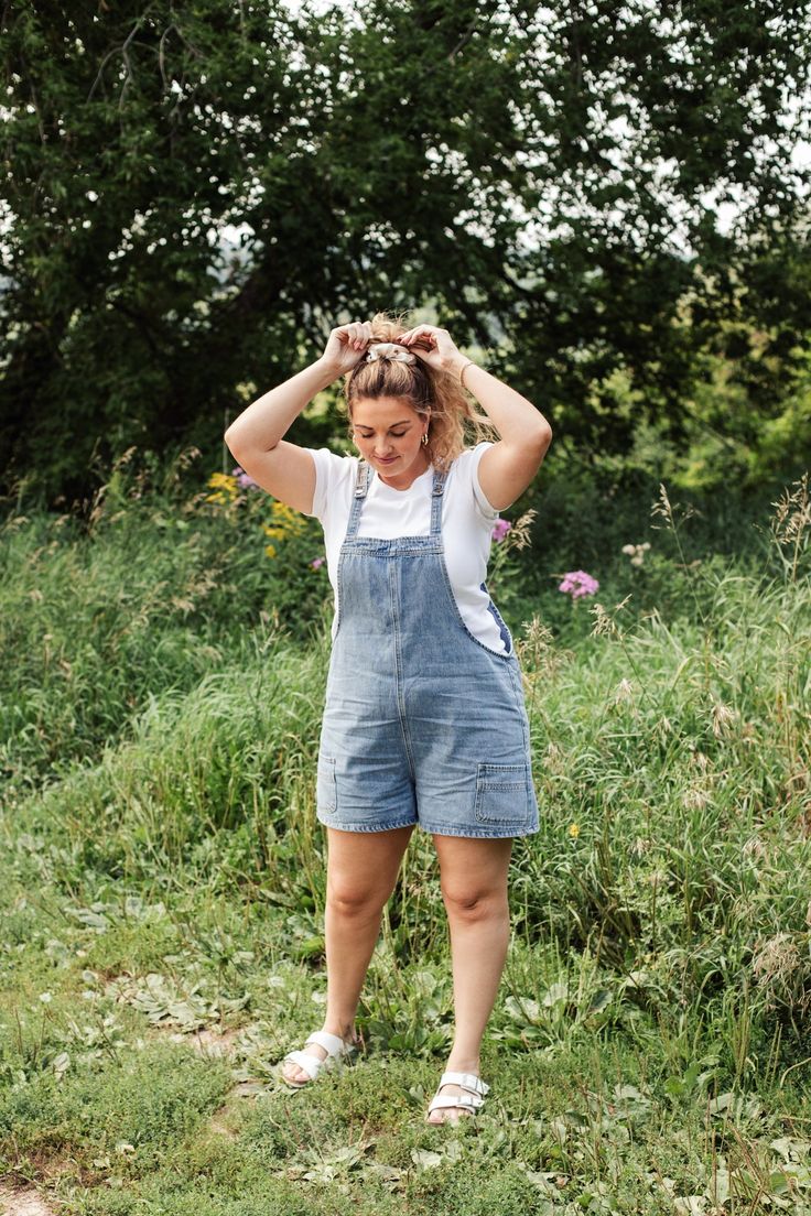 How obsessed are we with this adorable jean romper?! We're in love!!!! Medium washed- relaxed fit - 100% cotton - Non stretch - Pocket front detail - Button shoulder Model is wearing a size XL and is 5'8 Denim Shortalls For Day Out, Casual Shortalls Overalls For Day Out, Relaxed Fit Cotton Shortalls For Day Out, Light Wash Cotton Overall Shortalls, Light Wash Cotton Shortalls, Medium Wash Overalls For Day Out, Casual Relaxed Fit Shortalls For Day Out, Washed Cotton Denim Jumpsuit For Day Out, Jean Romper