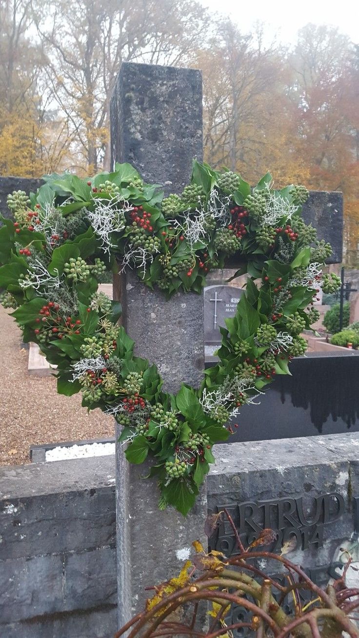 a wreath is placed on top of a grave