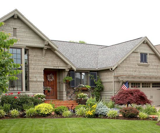 a house with landscaping in the front yard