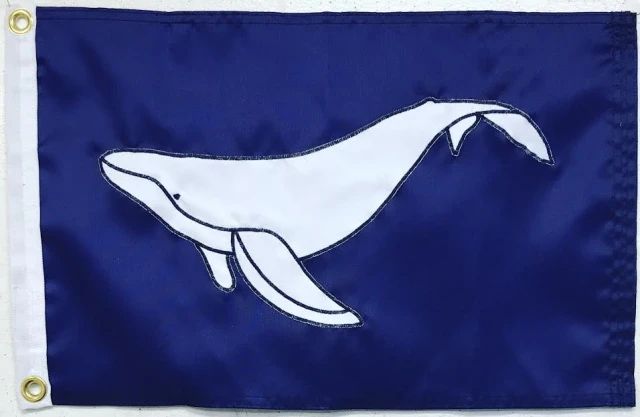 a blue and white flag with a whale on it