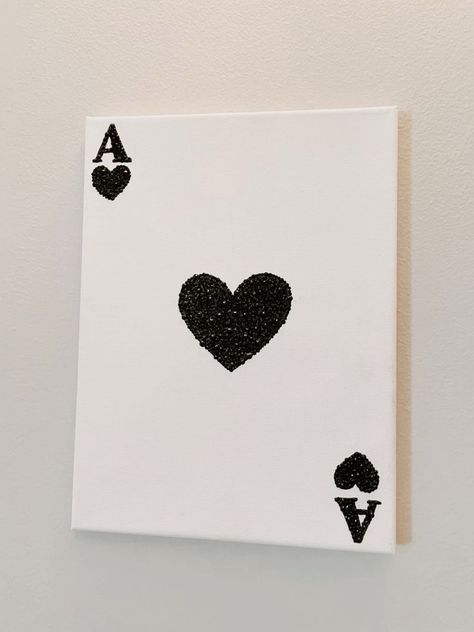 a card that has some black hearts on it