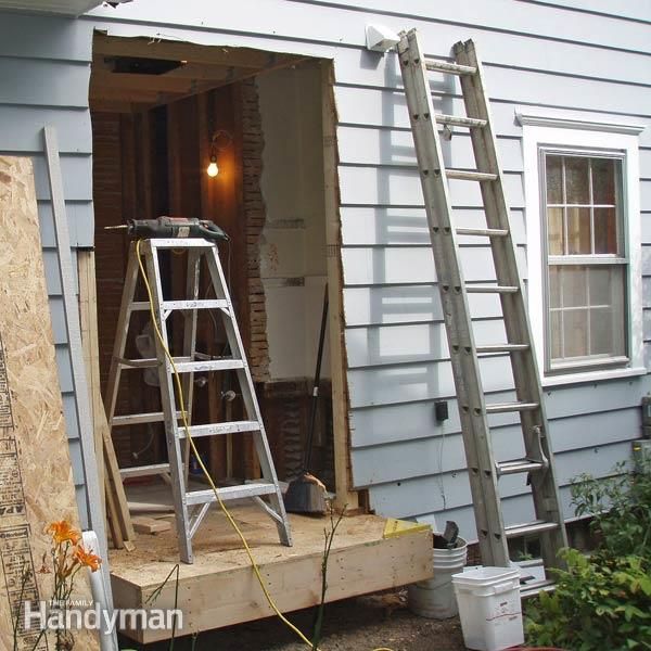 a ladder leaning against the side of a house