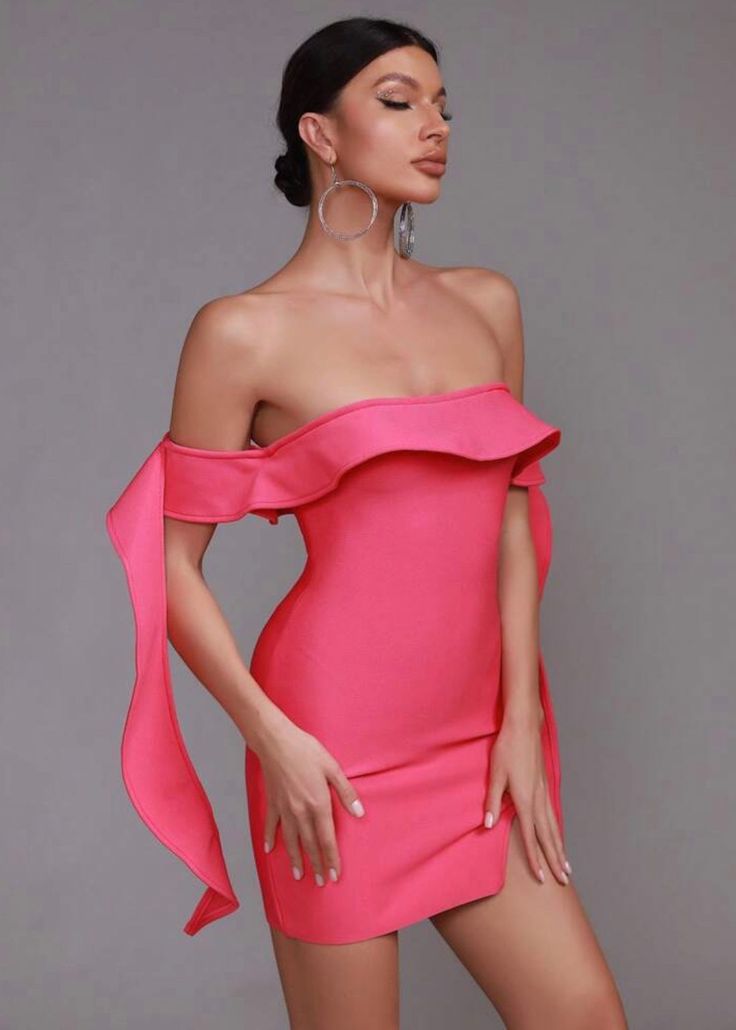 Step out in style in this off-shoulder ruffle-trimmed dress. Crafted from a soft, hot-pink fabric, the split hem adds a chic silhouette to any wardrobe. Sleek and sophisticated, this is the perfect statement piece for a special night out. Fit Type: Slim Fit Fabric: High Stretch Material: 95% Polyester, 5% Elastane Feminine Off-shoulder Bodycon Party Dress, Pink Off-shoulder Midi Cocktail Dress, Off-shoulder Ruffled Dress For Gala, Feminine Strapless Off Shoulder Dress With Ruffles, Flirty Dress With Ruffles And Straight Neckline, Feminine Strapless Off-shoulder Dress With Ruffles, Elegant Strapless Dress With Ruffles And Straight Neckline, Date Night Dress With Ruffles And Straight Neckline, Chic Off-shoulder Stretch Dress