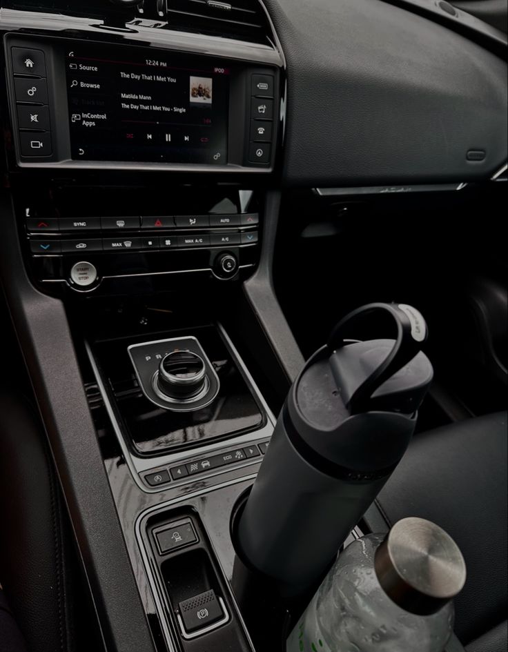 the interior of a modern car with electronic controls