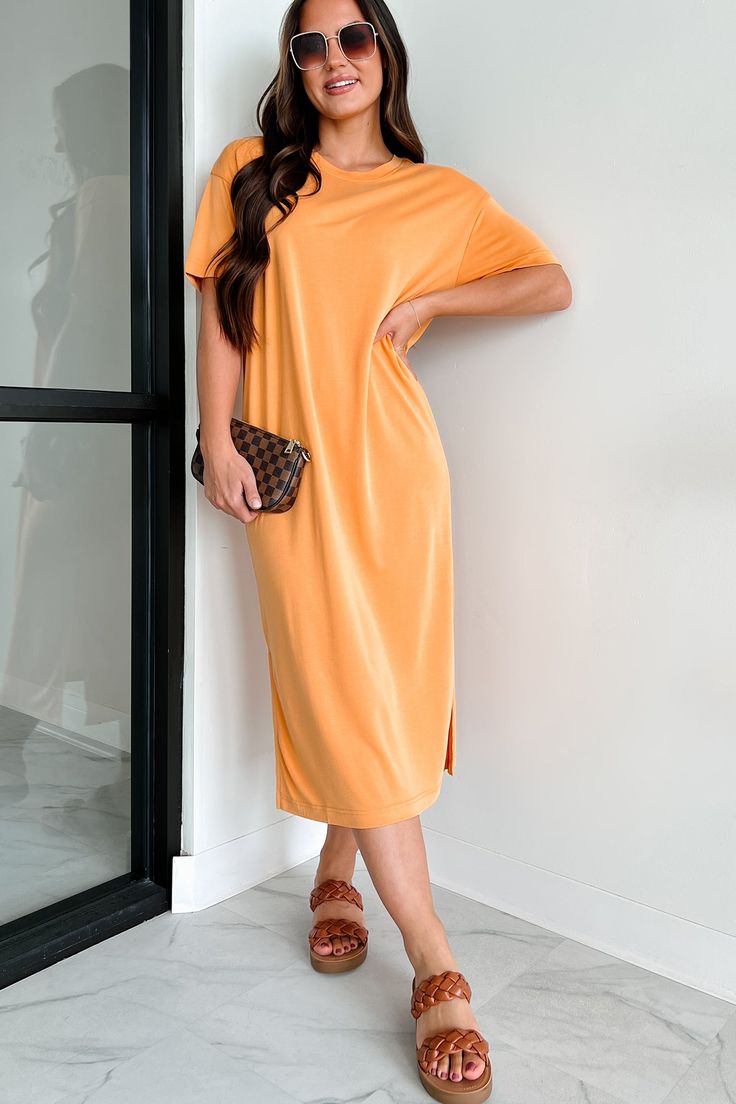 82% MODAL, 18% POLYESTER Model Wearing Size Small Color: Orange Style: T-Shirt Dress Short Sleeves Side Leg Slits Midi Length Relaxed Fit Dress Has Stretch 3“ Armpit To Sleeve End 36" Armpit To Hemline For Model Size Specs Please Check Size Charts Launched: 7/8/24 Casual Solid Midi Dress With Side Slits, Summer Dress With Side Slits And Crew Neck, Summer Dresses With Side Slits And Crew Neck, Casual Longline Midi Dress With Side Slits, Casual Dresses With Side Slits And Split Hem, Casual Orange Maxi Dress, Casual Short Sleeve Midi Dress With Side Slits, Casual Longline Midi Dress For Loungewear, Casual Midi Dress With Side Slits And Short Sleeves