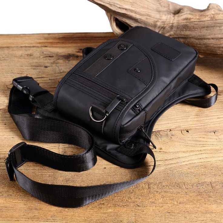 Do you end up with stuffed pockets when you don't really want to carry a rucksack or a bag? In that case, this Premium Biker Leg Bag is just what you need! It looks cool and will compliment your biker look. At the same time, it is roomy enough for all your essential items like wallets, cards, keys, smartphone, earbuds, etc. With this leg bag, you can relax and be sure that you have a secure, durable, and easy to carry accessory The Premium Biker Leg Bag is made from high-quality Oxford material Multifunctional Anti-theft Outdoor Backpack, Black Anti-theft Chest Bag, Black Anti-theft Shoulder Chest Bag, Multifunctional Anti-theft Shoulder Bag For Outdoor Activities, Multifunctional Anti-theft Shoulder Bag For Outdoor, Multifunctional Chest Bag With Anti-theft Pocket, Multifunctional Outdoor Anti-theft Shoulder Bag, Black Nylon Chest Bag For Outdoor, Anti-theft Shoulder Chest Bag For Outdoor Activities