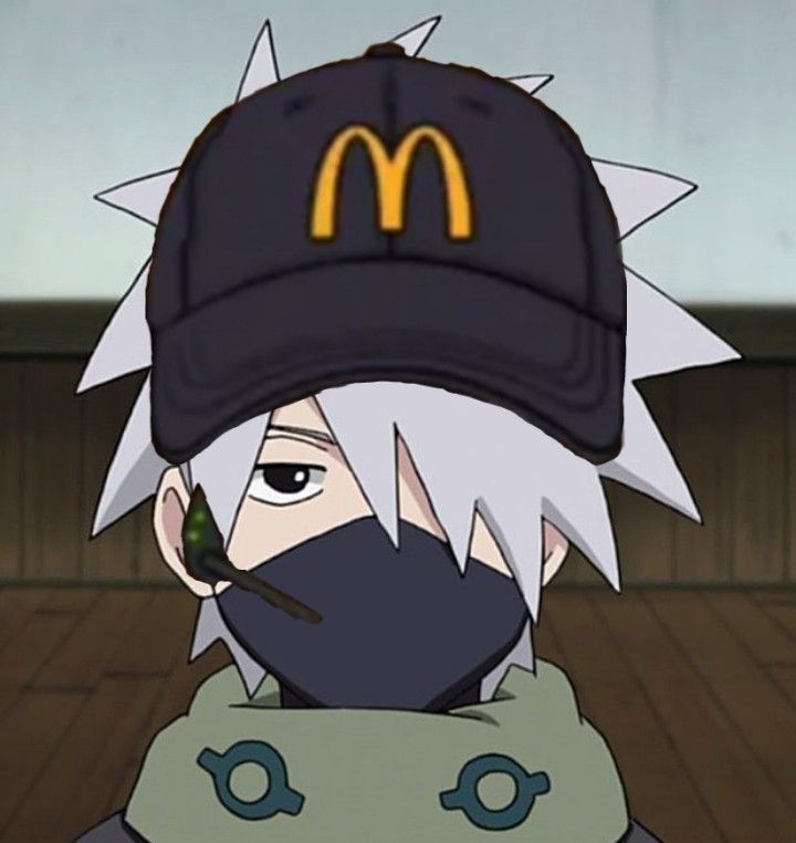 a person wearing a black hat and green jacket with a mcdonald's logo on it